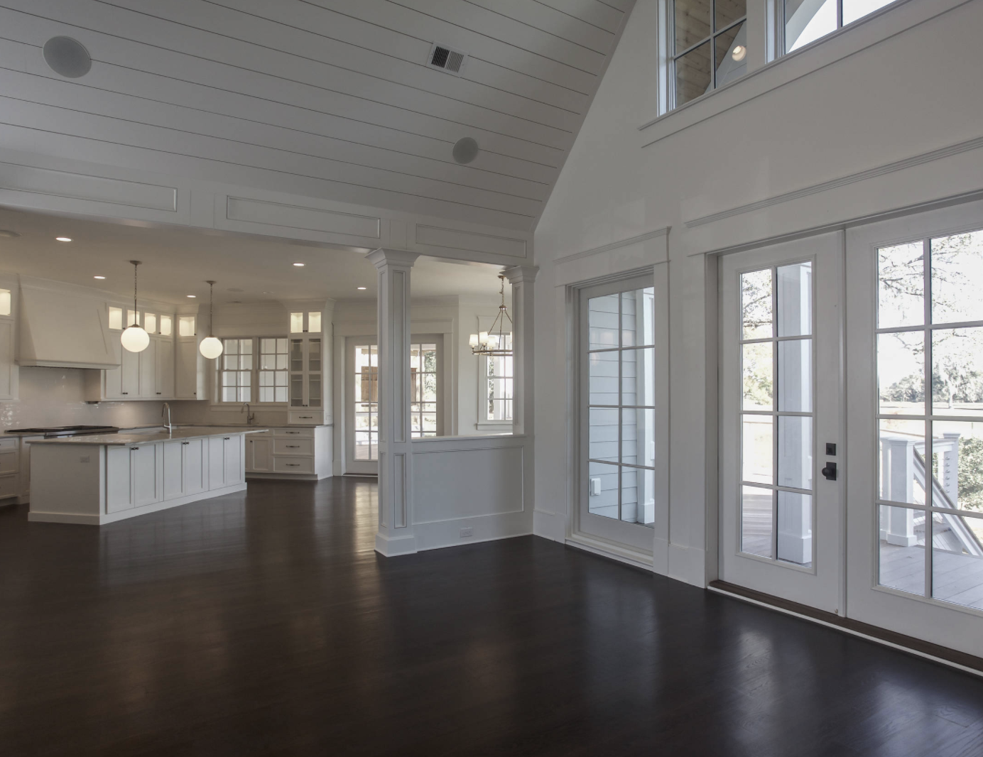 Living and Kitchen area, white shiplap ceiling, open concept, white kitchen, custom home, custom builder